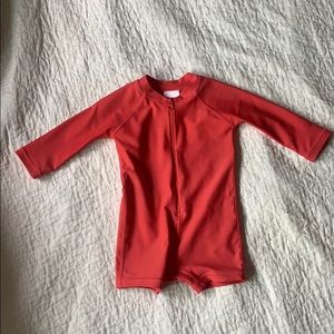 Hanna Anderson red rash guard. GUC. US 3-6